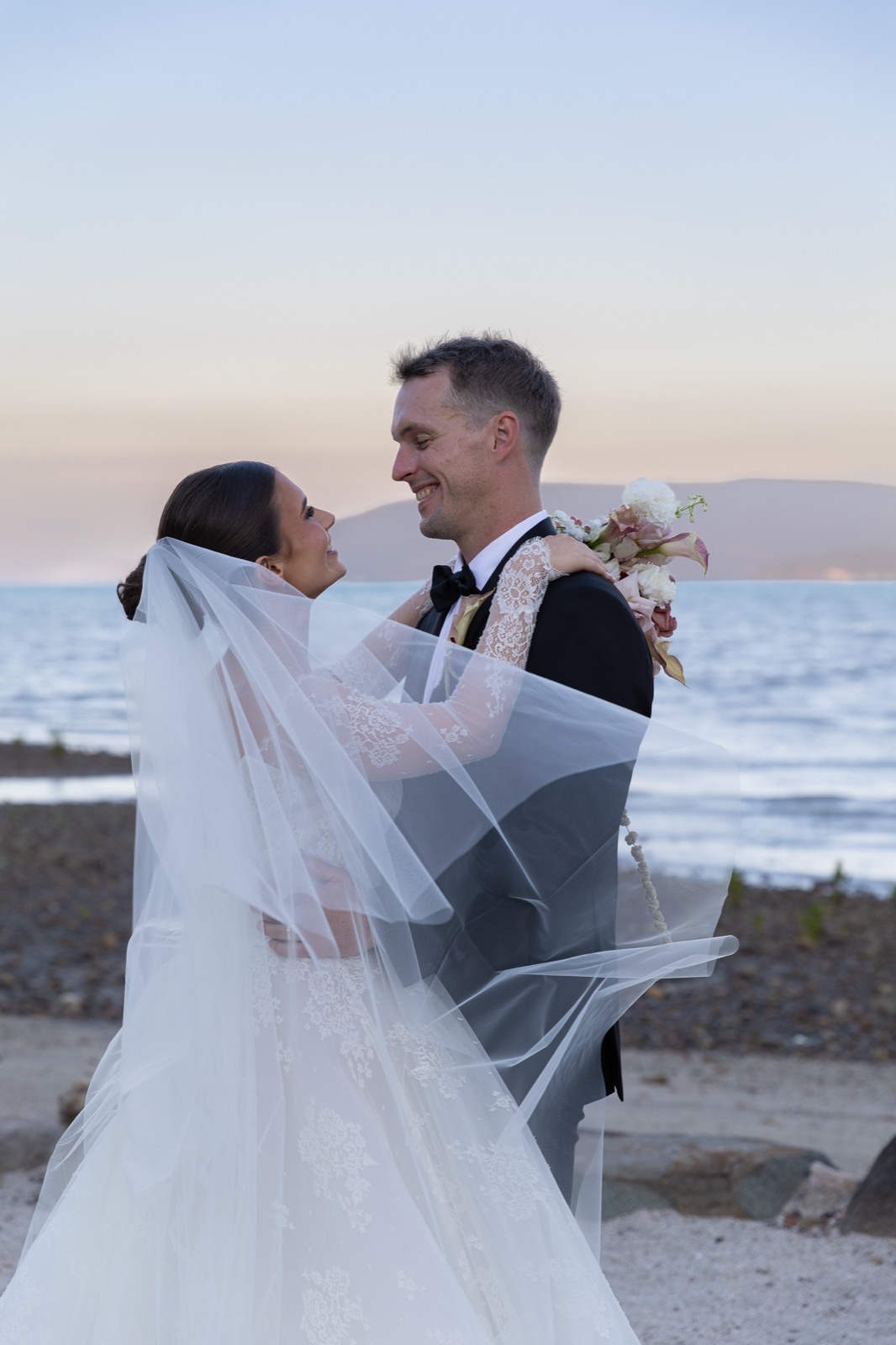 Couple — veil at sunset