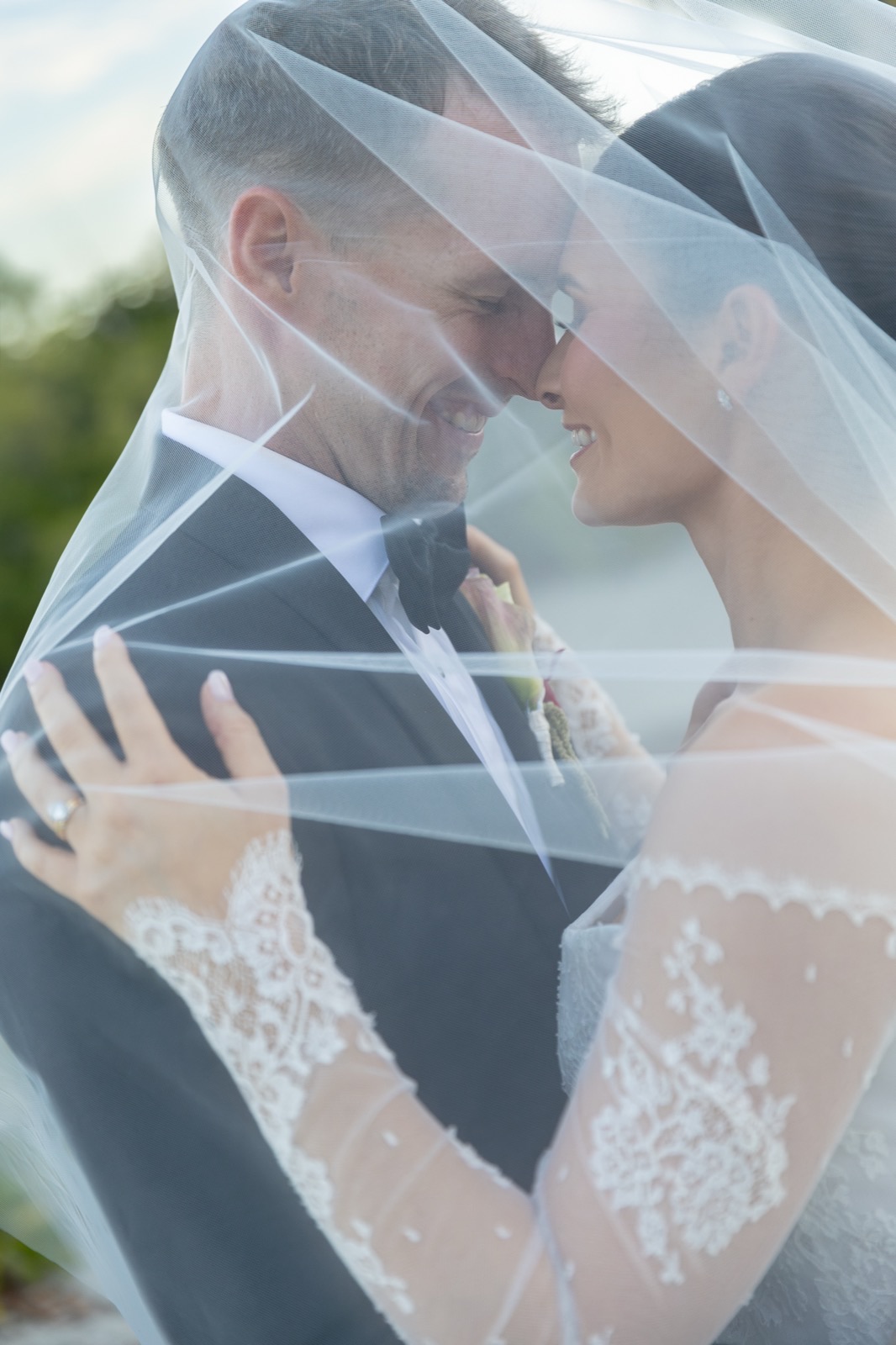 Couple — under veil